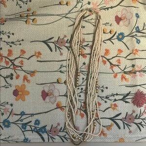 Elegant Beaded Necklace with Gold Accents